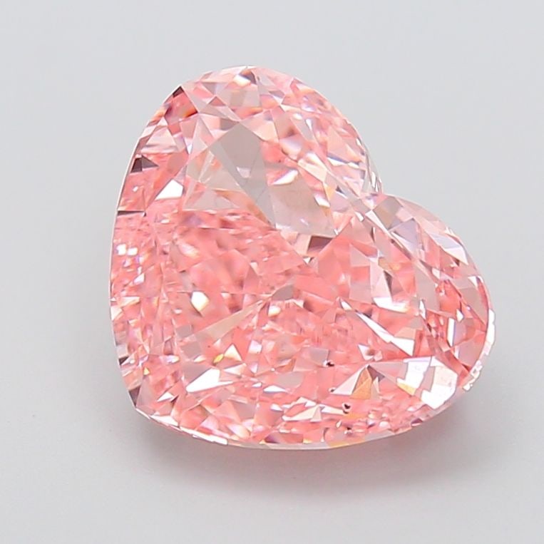 Loose Diamond - HEART 6.05ct Fancy Vivid Pink SI1: Loose Diamond - HEART 6.05ct Fancy Vivid Pink SI1 Source: This is a real non-mined Diamond that has been grown in a lab Shape: HEART Carats: 6.05 Color: Fancy Vivid Pink Certification: IGI Video: