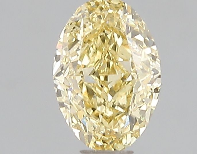 Loose Diamond - OVAL 1.01ct Fancy Intense Yellow VS2: Loose Diamond - OVAL 1.01ct Fancy Intense Yellow VS2 Source: This is a real non-mined Diamond that has been grown in a lab Shape: OVAL Carats: 1.01 Color: Fancy Intense Yellow Certification: IGI Video