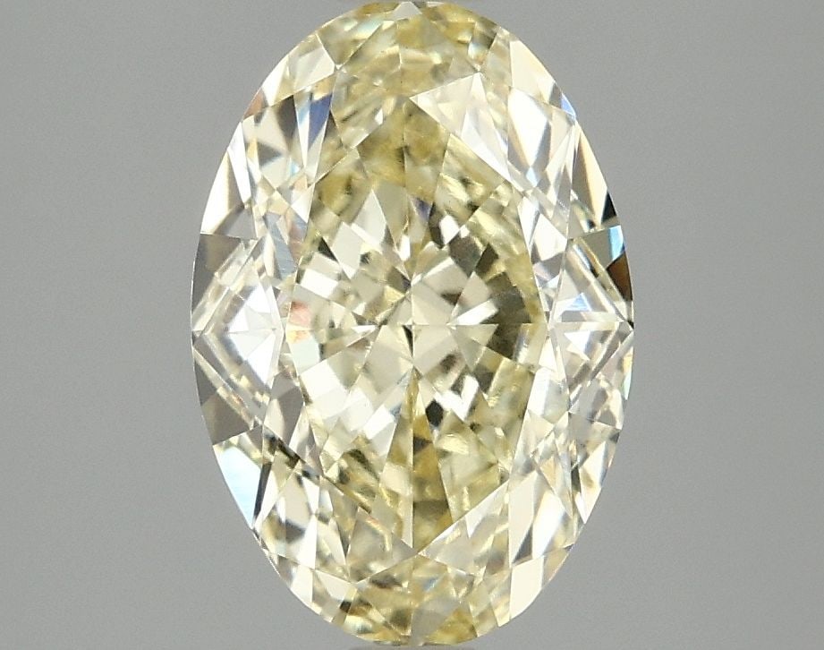 Loose Diamond - OVAL 3.04ct Fancy Yellow VVS2: Loose Diamond - OVAL 3.04ct Fancy Yellow VVS2 Source: This is a real non-mined Diamond that has been grown in a lab Shape: OVAL Carats: 3.04 Color: Fancy Yellow Certification: IGI Video: