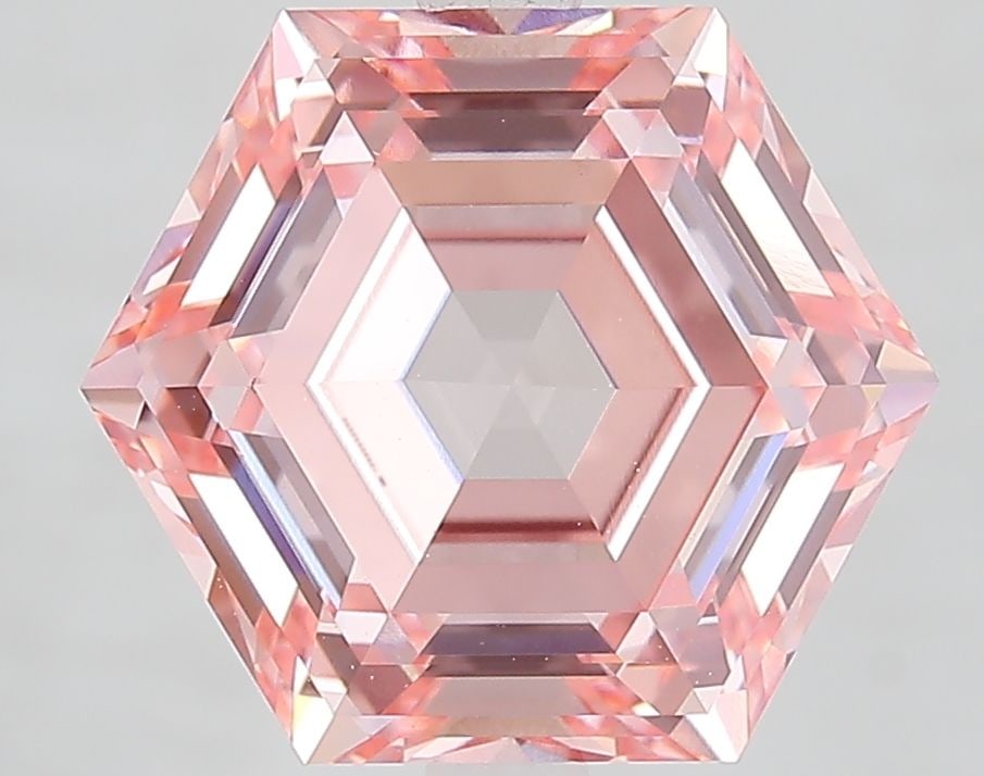 Loose Diamond - HEXAGONAL 5.09ct Fancy Vivid Pink VVS2: Loose Diamond - HEXAGONAL 5.09ct Fancy Vivid Pink VVS2 Source: This is a real non-mined Diamond that has been grown in a lab Shape: HEXAGONAL Carats: 5.09 Color: Fancy Vivid Pink Certification: IGI Vi