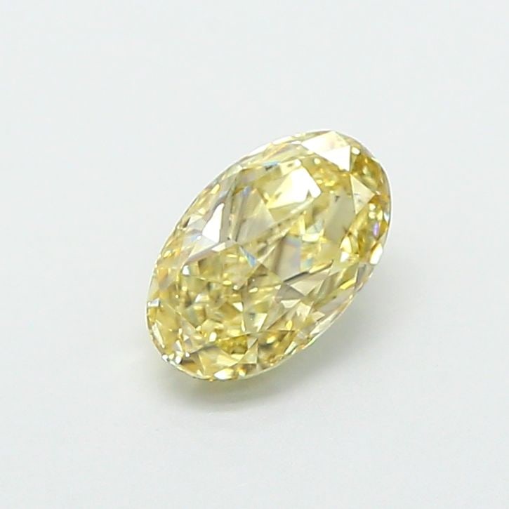 Loose Diamond - OVAL 0.71ct Fancy Yellow VS1: Loose Diamond - OVAL 0.71ct Fancy Yellow VS1 Source: This is a real non-mined Diamond that has been grown in a lab Shape: OVAL Carats: 0.71 Color: Fancy Yellow Certification: IGI Video: