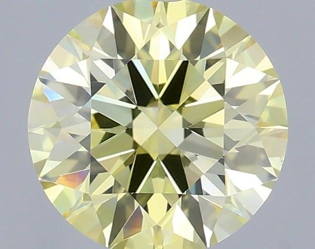 Ideal Loose Diamond - ROUND 0.9ct Fancy Yellow VS1: Ideal Loose Diamond - ROUND 0.9ct Fancy Yellow VS1 Source: This is a real non-mined Diamond that has been grown in a lab Shape: ROUND Carats: 0.9 Color: Fancy Yellow Certification: IGI Video: