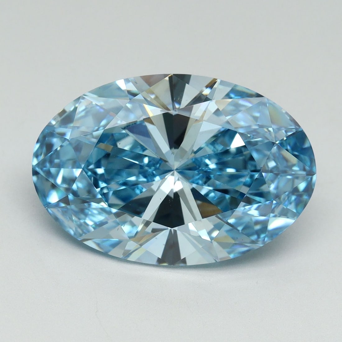Loose Diamond - OVAL 7.03ct Fancy Vivid Blue VS2: Loose Diamond - OVAL 7.03ct Fancy Vivid Blue VS2 Source: This is a real non-mined Diamond that has been grown in a lab Shape: OVAL Carats: 7.03 Color: Fancy Vivid Blue Certification: IGI Video: