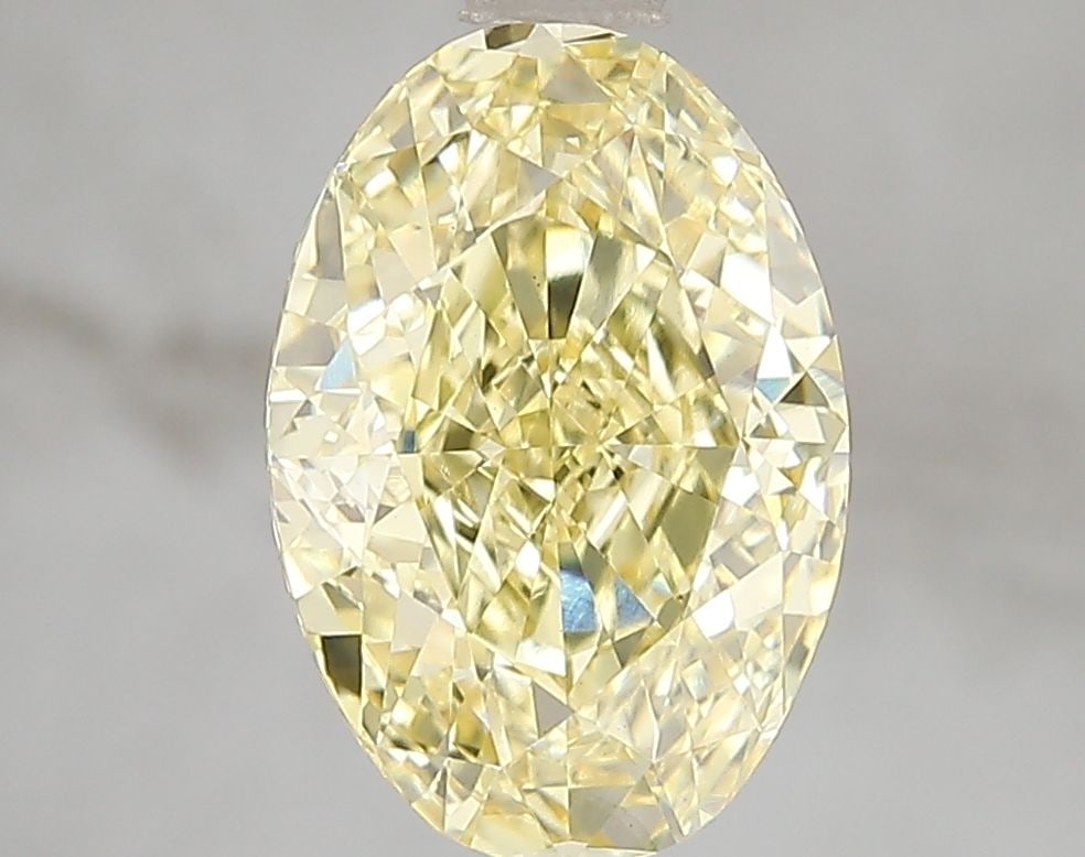 Loose Diamond - OVAL 3.0ct Fancy Vivid Yellow VS1: Loose Diamond - OVAL 3.0ct Fancy Vivid Yellow VS1 Source: This is a real non-mined Diamond that has been grown in a lab Shape: OVAL Carats: 3.0 Color: Fancy Vivid Yellow Certification: IGI Video: