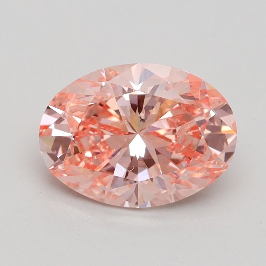 Loose Diamond - OVAL 1.55ct Fancy Vivid Orangey Pink SI2: Loose Diamond - OVAL 1.55ct Fancy Vivid Orangey Pink SI2 Source: This is a real non-mined Diamond that has been grown in a lab Shape: OVAL Carats: 1.55 Color: Fancy Vivid Orangey Pink Certification: I