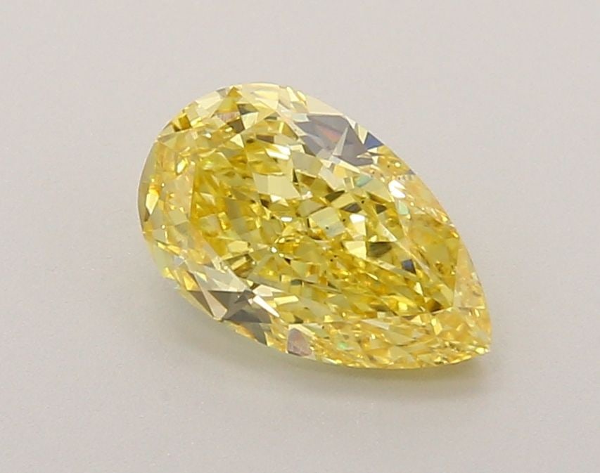 Loose Diamond - PEAR 1.23ct Fancy Vivid Yellow VS2: Loose Diamond - PEAR 1.23ct Fancy Vivid Yellow VS2 Source: This is a real non-mined Diamond that has been grown in a lab Shape: PEAR Carats: 1.23 Color: Fancy Vivid Yellow Certification: IGI Video: