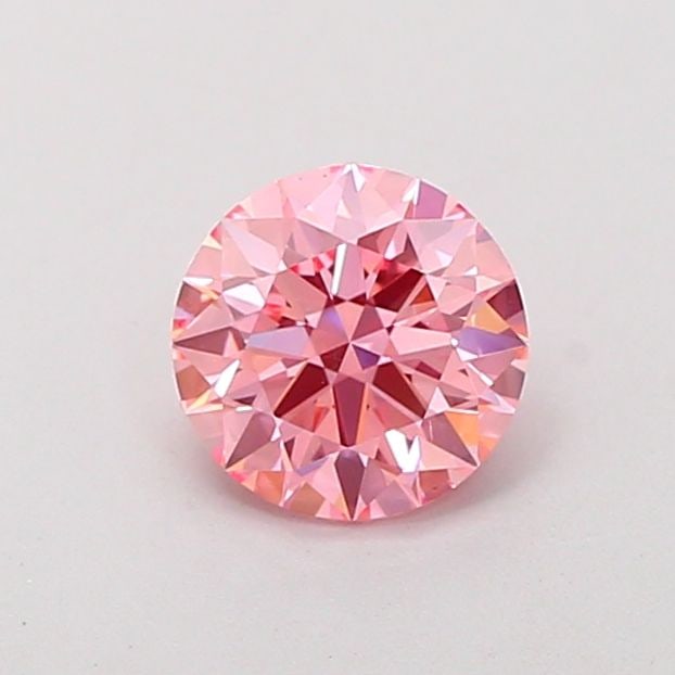 Ideal Loose Diamond - ROUND 0.91ct Fancy Vivid Pink VS2: Ideal Loose Diamond - ROUND 0.91ct Fancy Vivid Pink VS2 Source: This is a real non-mined Diamond that has been grown in a lab Shape: ROUND Carats: 0.91 Color: Fancy Vivid Pink Certification: IGI Video