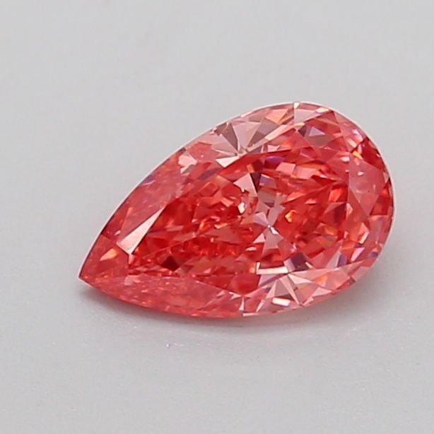 Loose Diamond - PEAR 0.7ct Fancy Vivid Pink VS1: Loose Diamond - PEAR 0.7ct Fancy Vivid Pink VS1 Source: This is a real non-mined Diamond that has been grown in a lab Shape: PEAR Carats: 0.7 Color: Fancy Vivid Pink Certification: IGI Video: