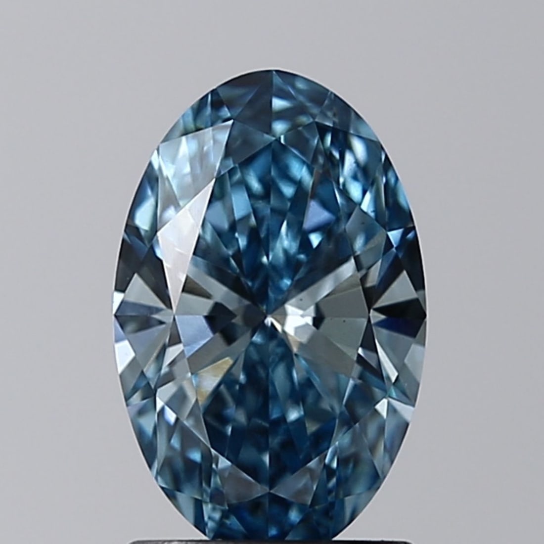 Loose Diamond - OVAL 1.22ct Fancy Vivid Blue VS1: Loose Diamond - OVAL 1.22ct Fancy Vivid Blue VS1 Source: This is a real non-mined Diamond that has been grown in a lab Shape: OVAL Carats: 1.22 Color: Fancy Vivid Blue Certification: IGI Video: