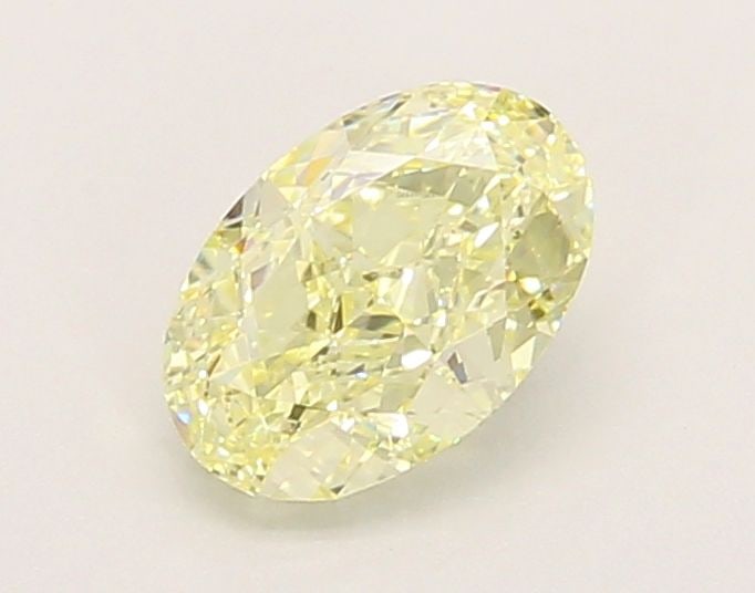 Loose Diamond - OVAL 1.05ct Fancy Yellow VVS2: Loose Diamond - OVAL 1.05ct Fancy Yellow VVS2 Source: This is a real non-mined Diamond that has been grown in a lab Shape: OVAL Carats: 1.05 Color: Fancy Yellow Certification: IGI Video: