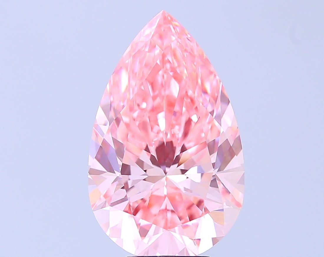 Loose Diamond - PEAR 7.7ct Fancy Vivid Pink VVS2: Loose Diamond - PEAR 7.7ct Fancy Vivid Pink VVS2 Source: This is a real non-mined Diamond that has been grown in a lab Shape: PEAR Carats: 7.7 Color: Fancy Vivid Pink Certification: IGI Video: