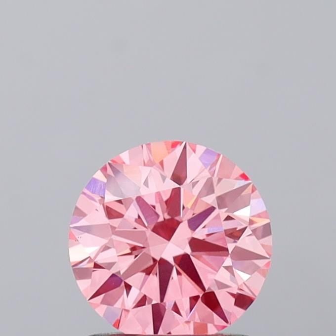 Ideal Loose Diamond - ROUND 1.07ct Fancy Vivid Pink VS1: Ideal Loose Diamond - ROUND 1.07ct Fancy Vivid Pink VS1 Source: This is a real non-mined Diamond that has been grown in a lab Shape: ROUND Carats: 1.07 Color: Fancy Vivid Pink Certification: IGI Video