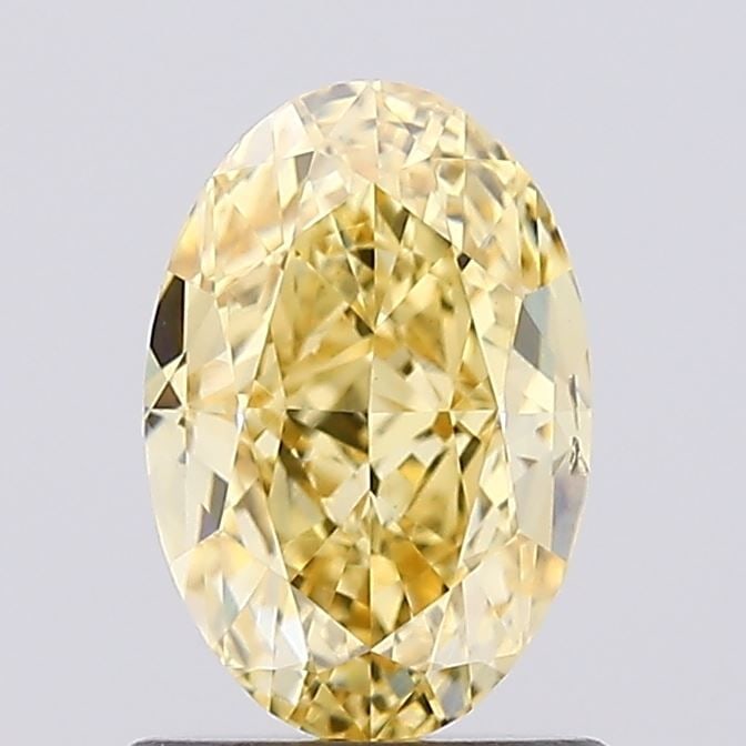 Loose Diamond - OVAL 1.24ct Fancy Intense Yellow VS2: Loose Diamond - OVAL 1.24ct Fancy Intense Yellow VS2 Source: This is a real non-mined Diamond that has been grown in a lab Shape: OVAL Carats: 1.24 Color: Fancy Intense Yellow Certification: IGI Video