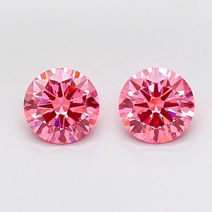 Ideal Loose Diamond - ROUND 1.56ct Fancy Vivid Pink VS1: Ideal Loose Diamond - ROUND 1.56ct Fancy Vivid Pink VS1 Source: This is a real non-mined Diamond that has been grown in a lab Shape: ROUND Carats: 1.56 Color: Fancy Vivid Pink Certification: IGI