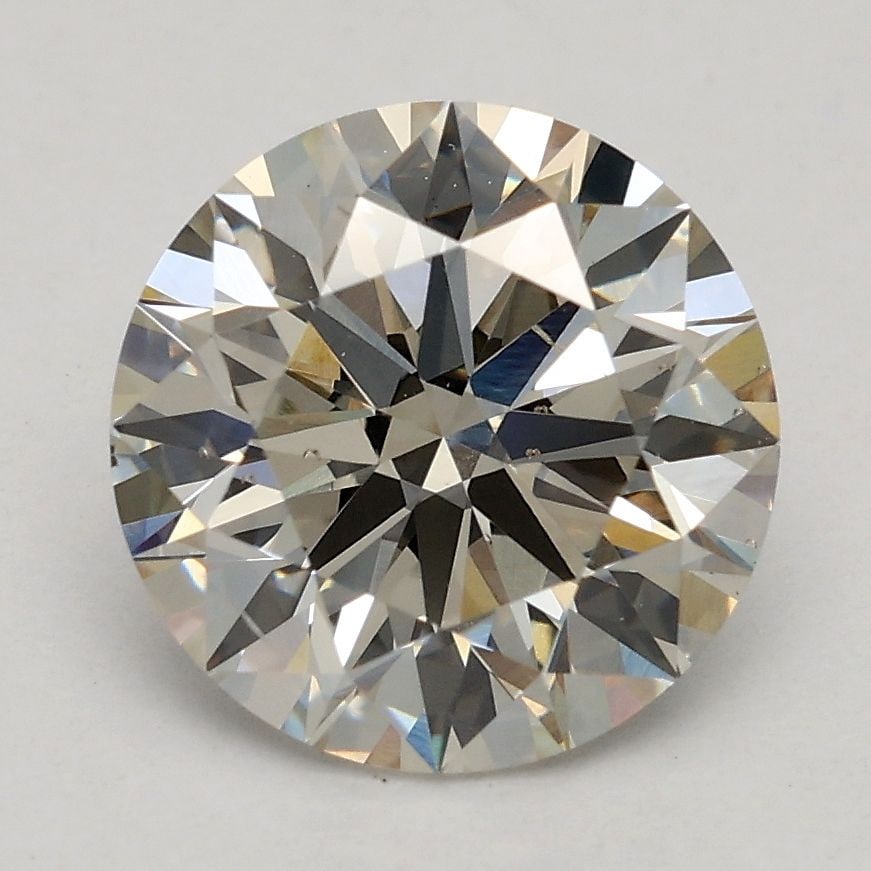 Ideal Loose Diamond - ROUND 2.01ct K VS2: Ideal Loose Diamond - ROUND 2.01ct K VS2 Source: This is a real non-mined Diamond that has been grown in a lab Shape: ROUND Carats: 2.01 Color: K Clarity: VS2 Certification: IGI Video: