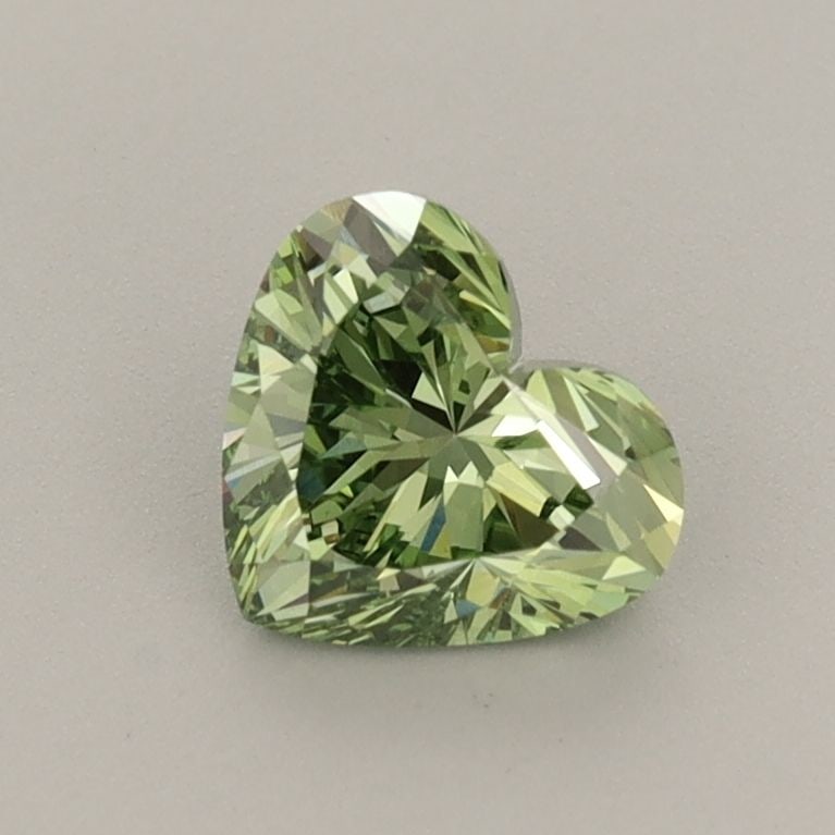 Loose Diamond - HEART 0.71ct Fancy Vivid Green VVS2: Loose Diamond - HEART 0.71ct Fancy Vivid Green VVS2 Source: This is a real non-mined Diamond that has been grown in a lab Shape: HEART Carats: 0.71 Color: Fancy Vivid Green Certification: IGI Video: