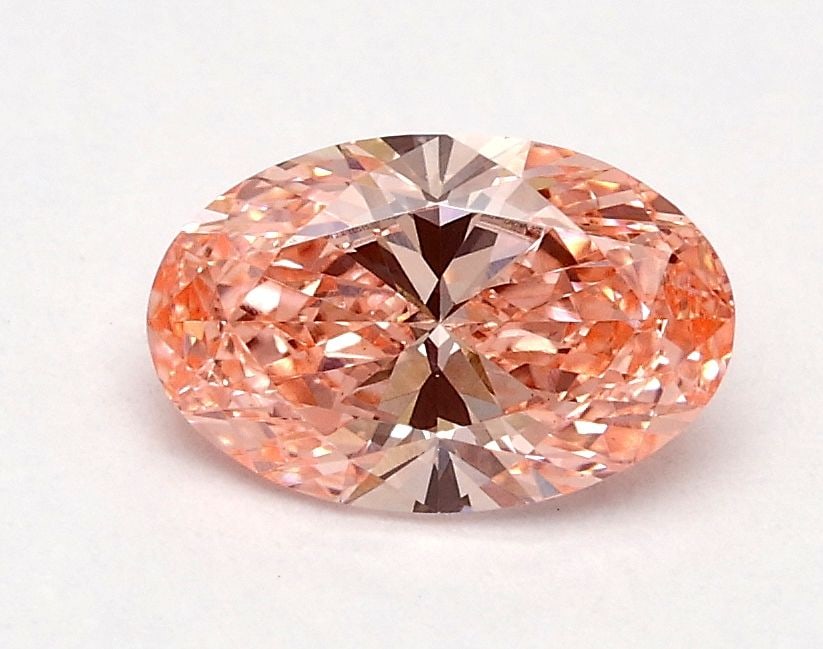 Loose Diamond - OVAL 0.61ct Fancy Vivid Pink VS1: Loose Diamond - OVAL 0.61ct Fancy Vivid Pink VS1 Source: This is a real non-mined Diamond that has been grown in a lab Shape: OVAL Carats: 0.61 Color: Fancy Vivid Pink Certification: IGI Video: