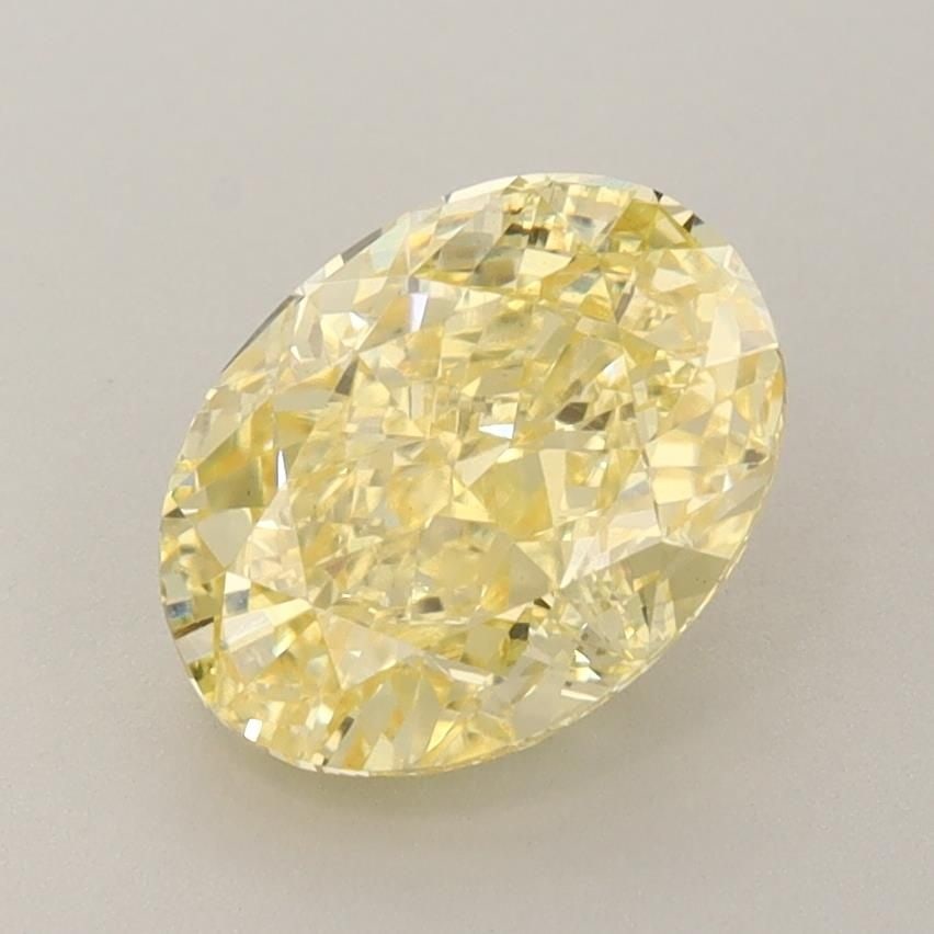 Loose Diamond - OVAL 2.07ct Fancy Vivid Yellow VS1: Loose Diamond - OVAL 2.07ct Fancy Vivid Yellow VS1 Source: This is a real non-mined Diamond that has been grown in a lab Shape: OVAL Carats: 2.07 Color: Fancy Vivid Yellow Certification: IGI Video: