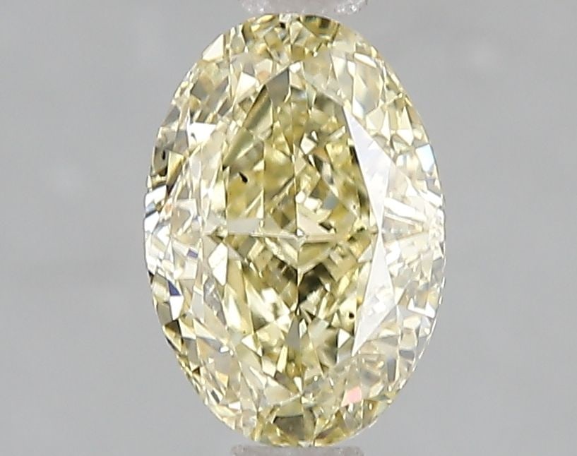 Loose Diamond - OVAL 1.53ct Fancy Yellow VS2: Loose Diamond - OVAL 1.53ct Fancy Yellow VS2 Source: This is a real non-mined Diamond that has been grown in a lab Shape: OVAL Carats: 1.53 Color: Fancy Yellow Certification: IGI Video:
