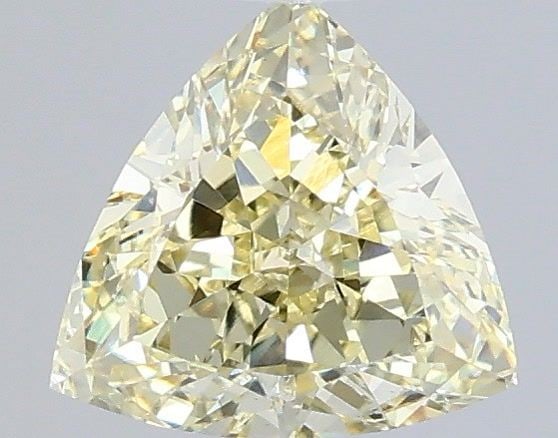 Loose Diamond - TRIANGULAR 1.09ct Fancy Yellow VS1: Loose Diamond - TRIANGULAR 1.09ct Fancy Yellow VS1 Source: This is a real non-mined Diamond that has been grown in a lab Shape: TRIANGULAR Carats: 1.09 Color: Fancy Yellow Certification: IGI Video: