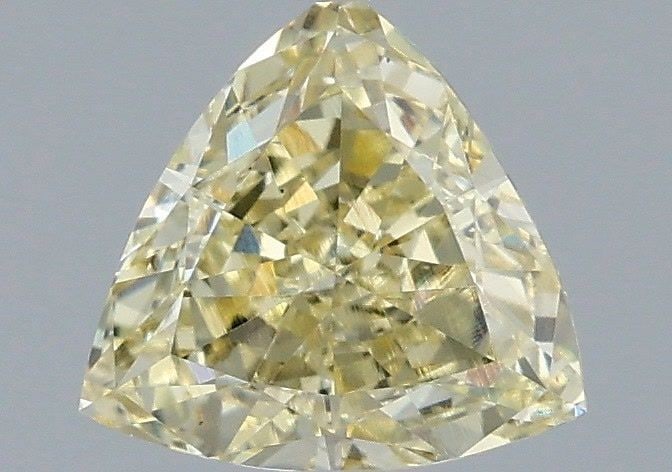 Loose Diamond - TRIANGULAR 1.05ct Fancy Yellow VS1: Loose Diamond - TRIANGULAR 1.05ct Fancy Yellow VS1 Source: This is a real non-mined Diamond that has been grown in a lab Shape: TRIANGULAR Carats: 1.05 Color: Fancy Yellow Certification: IGI Video: