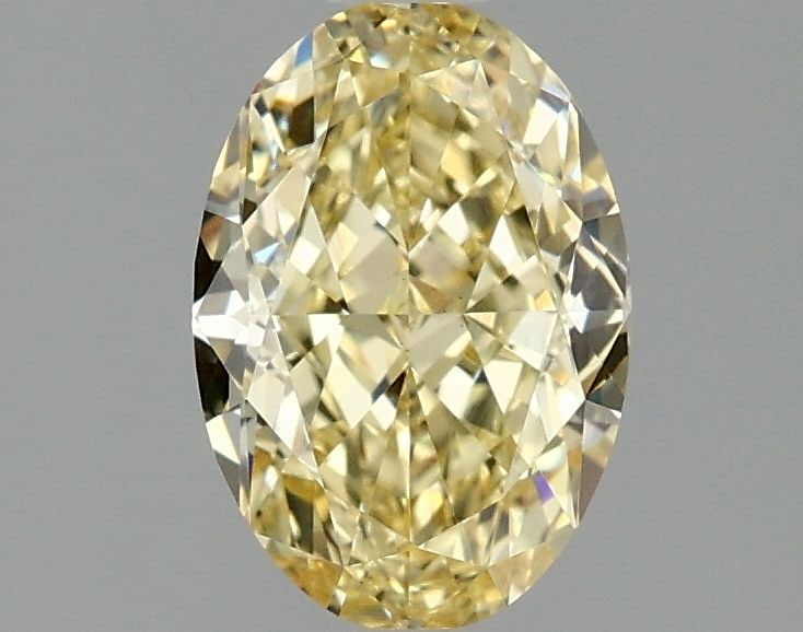 Loose Diamond - OVAL 1.55ct Fancy Intense Yellow VS1: Loose Diamond - OVAL 1.55ct Fancy Intense Yellow VS1 Source: This is a real non-mined Diamond that has been grown in a lab Shape: OVAL Carats: 1.55 Color: Fancy Intense Yellow Certification: IGI