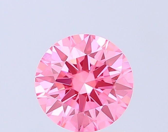 Ideal Loose Diamond - ROUND 1.41ct Fancy Vivid Pink VS1: Ideal Loose Diamond - ROUND 1.41ct Fancy Vivid Pink VS1 Source: This is a real non-mined Diamond that has been grown in a lab Shape: ROUND Carats: 1.41 Color: Fancy Vivid Pink Certification: IGI Video