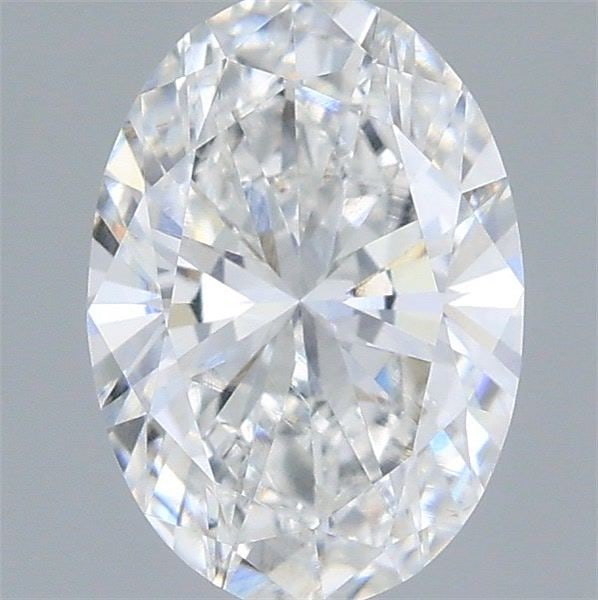 Loose Diamond - OVAL 0.79ct E VVS2: Loose Diamond - OVAL 0.79ct E VVS2 Source: This is a real non-mined Diamond that has been grown in a lab Shape: OVAL Carats: 0.79 Color: E Clarity: VVS2 Certification: IGI Video: