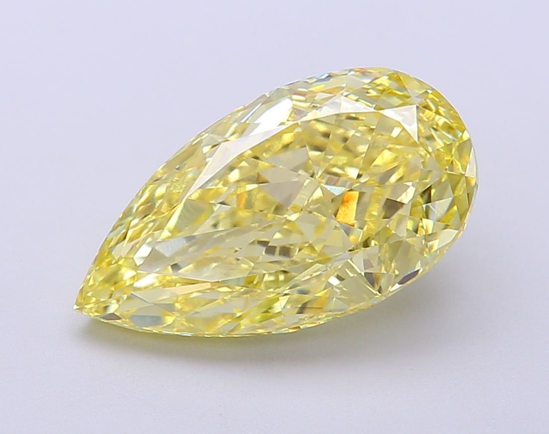 Loose Diamond - PEAR 5.02ct Fancy Vivid Yellow VS1: Loose Diamond - PEAR 5.02ct Fancy Vivid Yellow VS1 Source: This is a real non-mined Diamond that has been grown in a lab Shape: PEAR Carats: 5.02 Color: Fancy Vivid Yellow Certification: IGI Video: