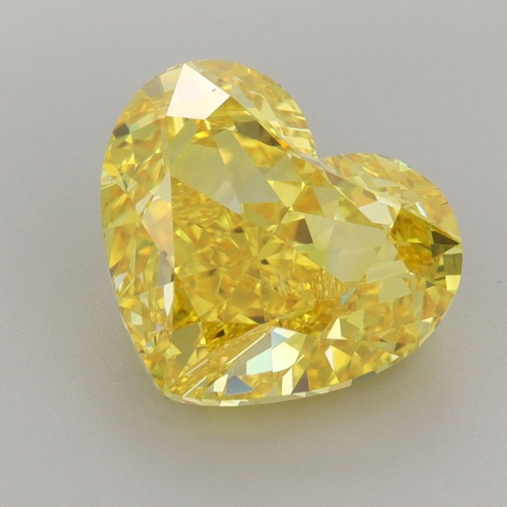 Loose Diamond - HEART 4.02ct Fancy Vivid Yellow VS1: Loose Diamond - HEART 4.02ct Fancy Vivid Yellow VS1 Source: This is a real non-mined Diamond that has been grown in a lab Shape: HEART Carats: 4.02 Color: Fancy Vivid Yellow Certification: IGI Additio