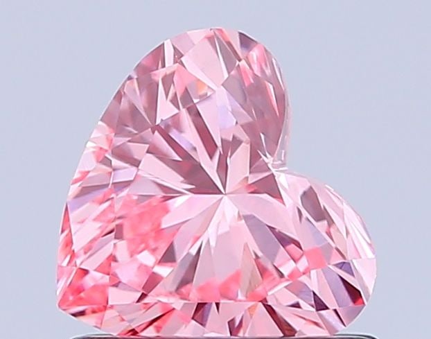 Loose Diamond - HEART 0.73ct Fancy Vivid Pink VS2: Loose Diamond - HEART 0.73ct Fancy Vivid Pink VS2 Source: This is a real non-mined Diamond that has been grown in a lab Shape: HEART Carats: 0.73 Color: Fancy Vivid Pink Certification: IGI Video: