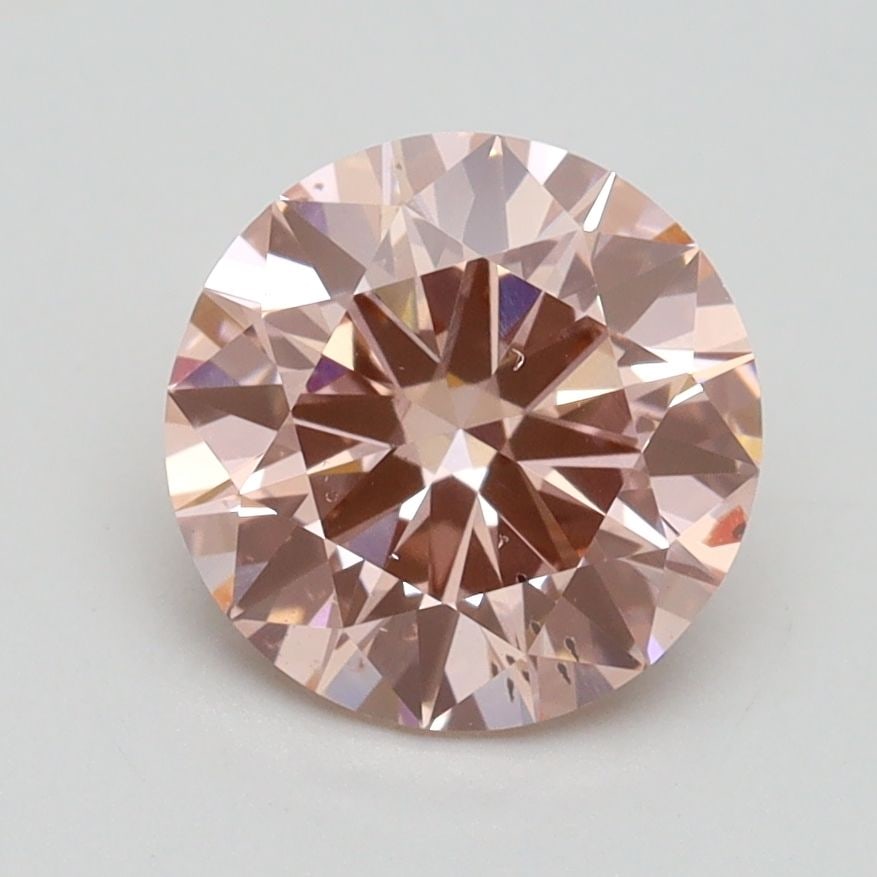 Loose Diamond - ROUND 1.83ct Fancy Intense Pink SI1: Loose Diamond - ROUND 1.83ct Fancy Intense Pink SI1 Source: This is a real non-mined Diamond that has been grown in a lab Shape: ROUND Carats: 1.83 Color: Fancy Intense Pink Certification: IGI Video: