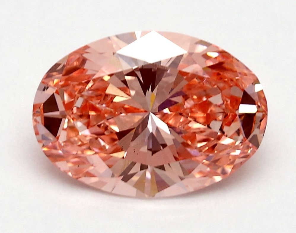 Loose Diamond - OVAL 1.71ct Fancy Vivid Pink VS2: Loose Diamond - OVAL 1.71ct Fancy Vivid Pink VS2 Source: This is a real non-mined Diamond that has been grown in a lab Shape: OVAL Carats: 1.71 Color: Fancy Vivid Pink Certification: IGI Video: