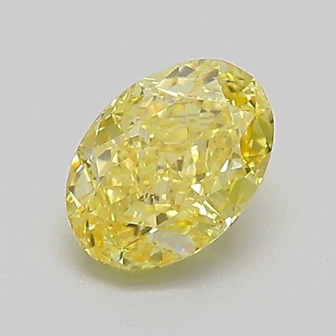 Loose Diamond - OVAL 0.8ct Fancy Vivid Yellow VVS2: Loose Diamond - OVAL 0.8ct Fancy Vivid Yellow VVS2 Source: This is a real non-mined Diamond that has been grown in a lab Shape: OVAL Carats: 0.8 Color: Fancy Vivid Yellow Certification: IGI Video: