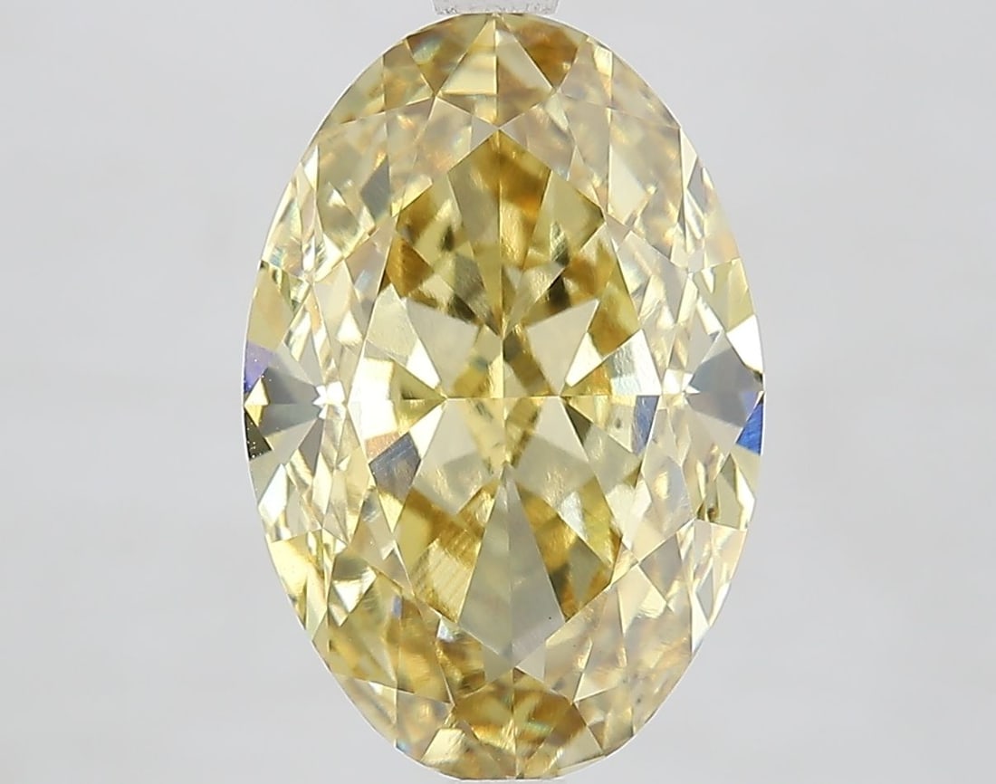Loose Diamond - OVAL 6.03ct Fancy Intense Yellow VVS2: Loose Diamond - OVAL 6.03ct Fancy Intense Yellow VVS2 Source: This is a real non-mined Diamond that has been grown in a lab Shape: OVAL Carats: 6.03 Color: Fancy Intense Yellow Certification: IGI Vide