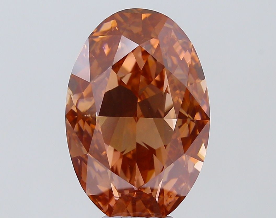 Loose Diamond - OVAL 8.06ct Fancy Orange Brown VVS1: Loose Diamond - OVAL 8.06ct Fancy Orange Brown VVS1 Source: This is a real non-mined Diamond that has been grown in a lab Shape: OVAL Carats: 8.06 Color: Fancy Orange Brown Certification: IGI Video: