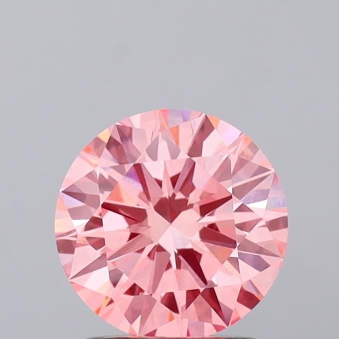 Loose Diamond - ROUND 1.52ct Fancy Vivid Pink VVS2: Loose Diamond - ROUND 1.52ct Fancy Vivid Pink VVS2 Source: This is a real non-mined Diamond that has been grown in a lab Shape: ROUND Carats: 1.52 Color: Fancy Vivid Pink Certification: IGI Video: