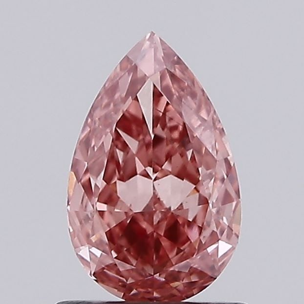 Loose Diamond - PEAR 1.0ct Fancy Vivid Pink VS1: Loose Diamond - PEAR 1.0ct Fancy Vivid Pink VS1 Source: This is a real non-mined Diamond that has been grown in a lab Shape: PEAR Carats: 1.0 Color: Fancy Vivid Pink Certification: IGI Video: Video