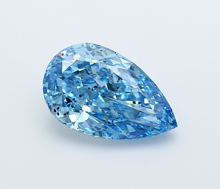 Loose Diamond - PEAR 2.47ct Fancy Vivid Blue SI1: Loose Diamond - PEAR 2.47ct Fancy Vivid Blue SI1 Source: This is a real non-mined Diamond that has been grown in a lab Shape: PEAR Carats: 2.47 Color: Fancy Vivid Blue Certification: IGI Video: