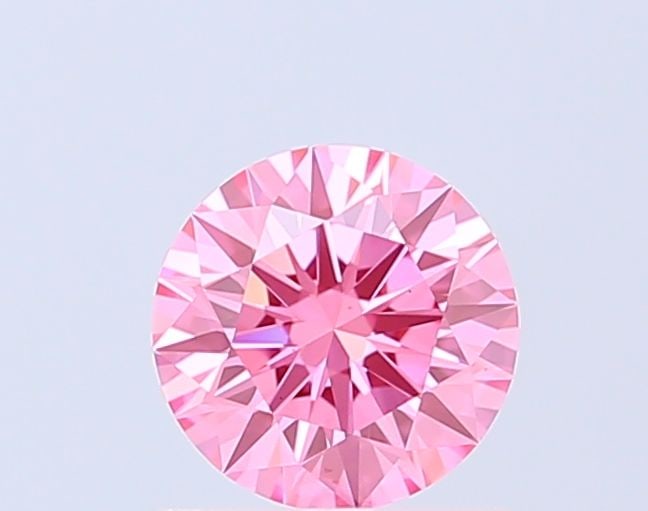 Ideal Loose Diamond - ROUND 1.06ct Fancy Vivid Pink VS1: Ideal Loose Diamond - ROUND 1.06ct Fancy Vivid Pink VS1 Source: This is a real non-mined Diamond that has been grown in a lab Shape: ROUND Carats: 1.06 Color: Fancy Vivid Pink Certification: IGI Video