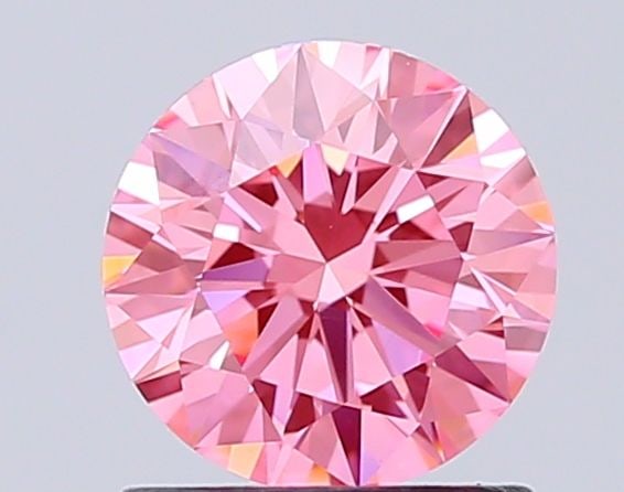 Ideal Loose Diamond - ROUND 1.03ct Fancy Vivid Pink VVS2: Ideal Loose Diamond - ROUND 1.03ct Fancy Vivid Pink VVS2 Source: This is a real non-mined Diamond that has been grown in a lab Shape: ROUND Carats: 1.03 Color: Fancy Vivid Pink Certification: IGI Vide