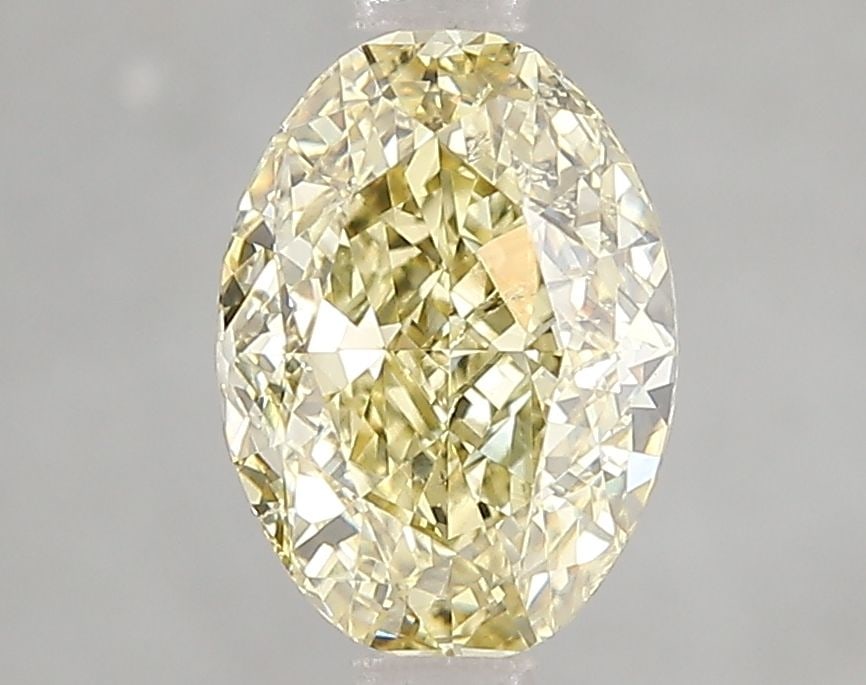 Loose Diamond - OVAL 2.02ct Fancy Intense Yellow VS2: Loose Diamond - OVAL 2.02ct Fancy Intense Yellow VS2 Source: This is a real non-mined Diamond that has been grown in a lab Shape: OVAL Carats: 2.02 Color: Fancy Intense Yellow Certification: IGI