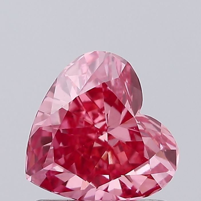 Loose Diamond - HEART 0.92ct Fancy Vivid Pink VS1: Loose Diamond - HEART 0.92ct Fancy Vivid Pink VS1 Source: This is a real non-mined Diamond that has been grown in a lab Shape: HEART Carats: 0.92 Color: Fancy Vivid Pink Certification: IGI Video:
