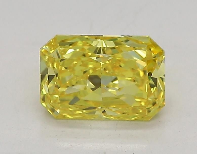 Loose Diamond - RADIANT 1.03ct Fancy Vivid Yellow VVS2: Loose Diamond - RADIANT 1.03ct Fancy Vivid Yellow VVS2 Source: This is a real non-mined Diamond that has been grown in a lab Shape: RADIANT Carats: 1.03 Color: Fancy Vivid Yellow Certification: IGI Vi