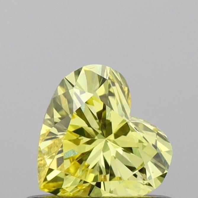 Loose Diamond - HEART 0.42ct Fancy Vivid Yellow VS2: Loose Diamond - HEART 0.42ct Fancy Vivid Yellow VS2 Source: This is a real non-mined Diamond that has been grown in a lab Shape: HEART Carats: 0.42 Color: Fancy Vivid Yellow Certification: IGI Video: