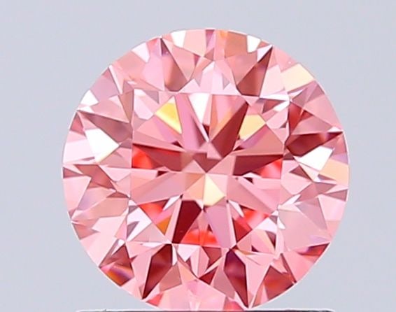 Ideal Loose Diamond - ROUND 1.1ct Fancy Vivid Pink VVS2: Ideal Loose Diamond - ROUND 1.1ct Fancy Vivid Pink VVS2 Source: This is a real non-mined Diamond that has been grown in a lab Shape: ROUND Carats: 1.1 Color: Fancy Vivid Pink Certification: IGI Video: