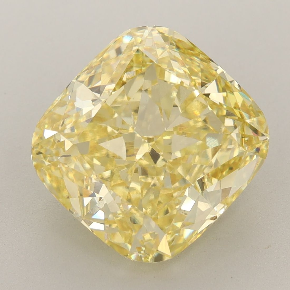 Loose Diamond - CUSHION BRILLIANT 7.03ct Fancy Vivid Yellow VVS2: Loose Diamond - CUSHION BRILLIANT 7.03ct Fancy Vivid Yellow VVS2 Source: This is a real non-mined Diamond that has been grown in a lab Shape: CUSHION BRILLIANT Carats: 7.03 Color: Fancy Vivid Yellow C