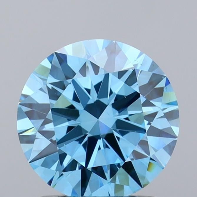 Ideal Loose Diamond - ROUND 1.5ct Fancy Vivid Blue VS1: Ideal Loose Diamond - ROUND 1.5ct Fancy Vivid Blue VS1 Source: This is a real non-mined Diamond that has been grown in a lab Shape: ROUND Carats: 1.5 Color: Fancy Vivid Blue Certification: IGI Video: