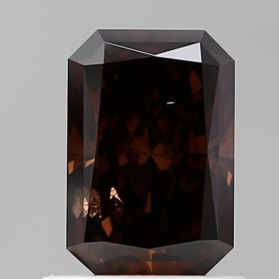 Loose Diamond - RADIANT 0.95ct Fancy Deep Brown SI2: Loose Diamond - RADIANT 0.95ct Fancy Deep Brown SI2 Source: This is a real non-mined Diamond that has been grown in a lab Shape: RADIANT Carats: 0.95 Color: Fancy Deep Brown Certification: IGI Video: