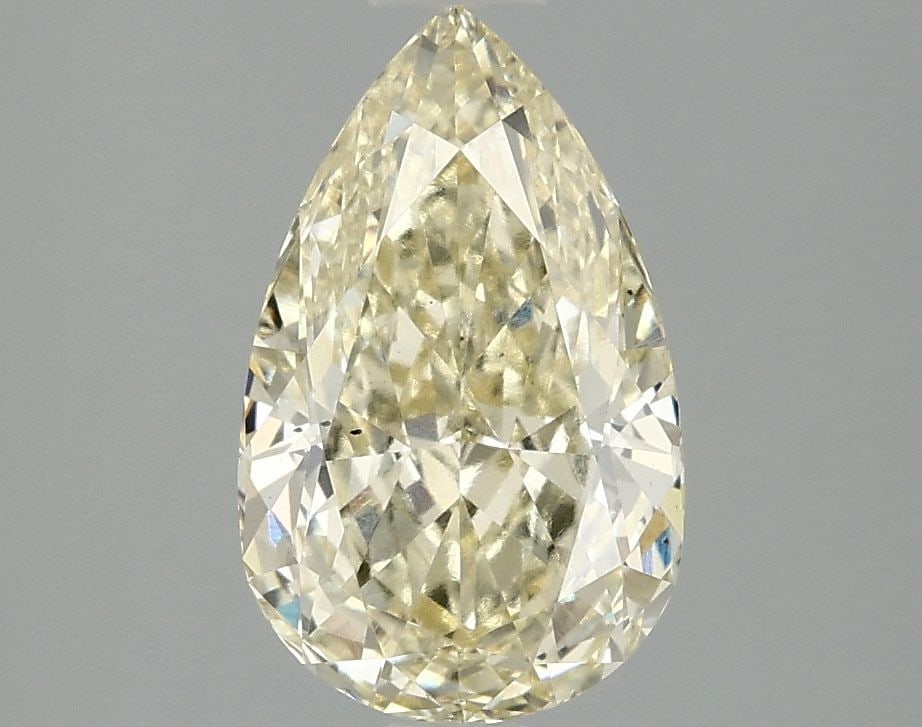 Loose Diamond - PEAR 2.05ct Fancy Yellow VS2: Loose Diamond - PEAR 2.05ct Fancy Yellow VS2 Source: This is a real non-mined Diamond that has been grown in a lab Shape: PEAR Carats: 2.05 Color: Fancy Yellow Certification: IGI Video: